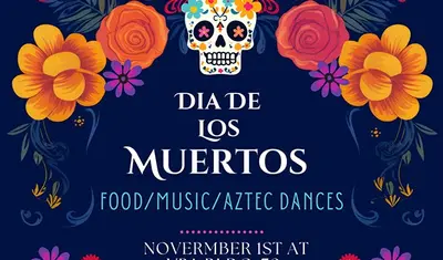 sugar skull and marigolds surround Dia de Los Muertos