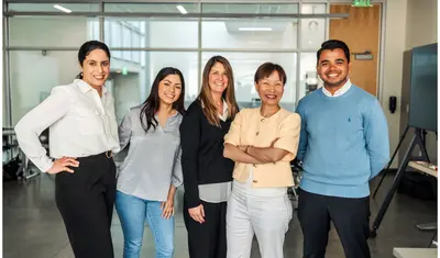 Group portrait of accounting professors and students