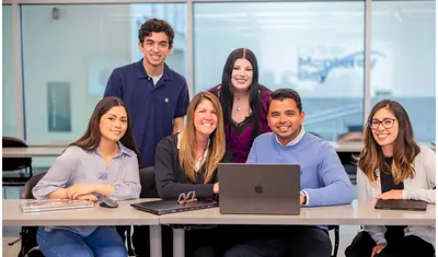 Group photo of accounting professor and students