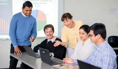 Accounting students with their professor