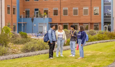 A group of students standing outside of the chapman science building