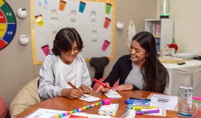 Angie Reyes-Ortiz, service learning