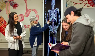 Students looking at a presentation.