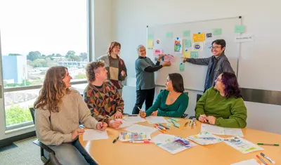 CSUMB environmental science students and faculty discuss ideas together during a collaborative classroom workshop.