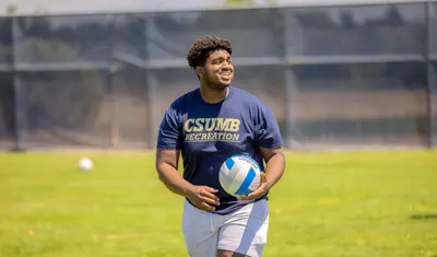 Student holding a football