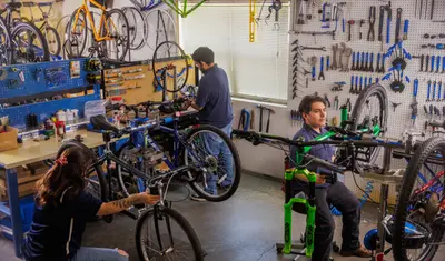 Students fixing bicycles
