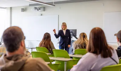 Teacher in front of classroom of students