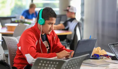 Student studying in library
