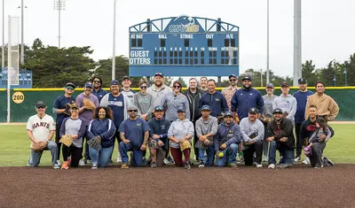 CSUMB staff posing on the softball field after the employee softball game.