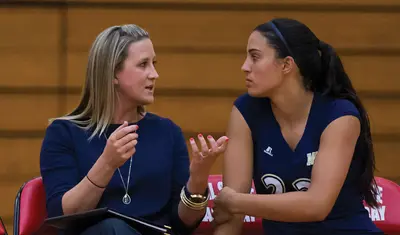 Photo: Moe Melhart advising a student athlete