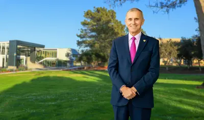 Photo: President Eduardo Ochoa at CSUMB smiling