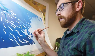 Photo: Nick Bezio creating art