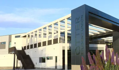 Photo: OSU building with purple flowers