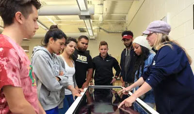 Trish Sevene with kinesiology students