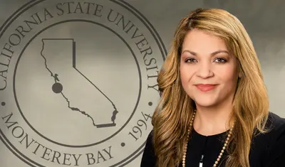 Portrait of Vanya Quinones with the CSUMB seal