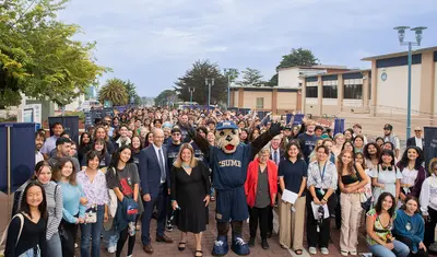 First-year students gather after Convocation outside the World Theater.