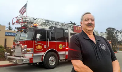 Ken Folsom with his fire truck