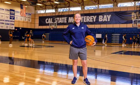Woman's basketball coach in the gym