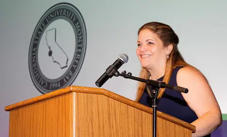 Vayna at podium during Day of Welcome