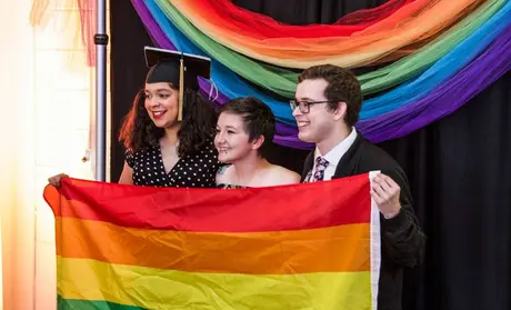 Students pose for a photo at the CSUMB Rainbow Graduation Celebration in 2019.