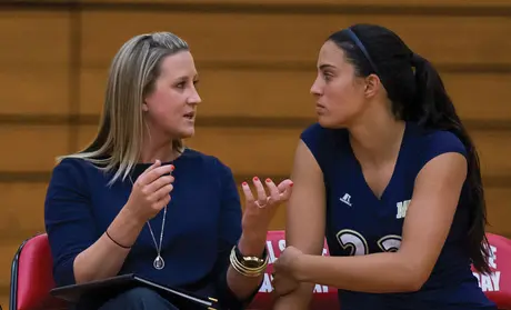 Photo: Moe Melhart advising a student athlete