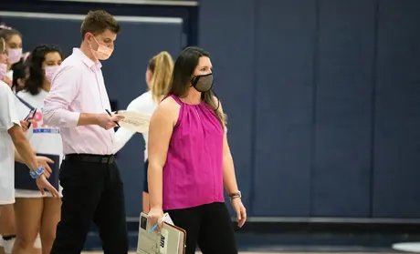 Courtney Materazzi coaching women's volleyball