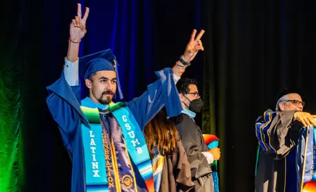 A Latinx student crosses the state at the stole ceremony