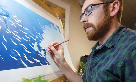 Photo: Nick Bezio creating art
