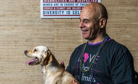 Photo: Steven Goings holding a dog