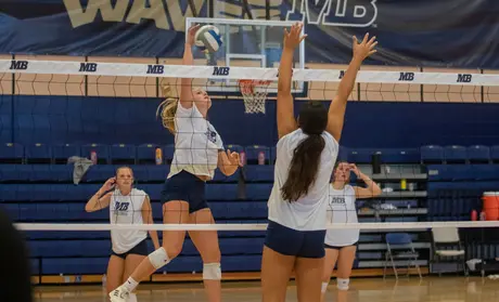 Volleyball players in 2022 practice