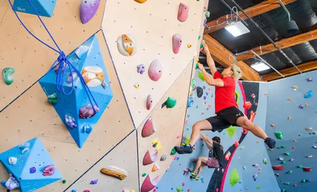 Students in CSUMB’s Monterey Bay Adventure Sports class learn to rock climb at Sanctuary Climbing and Fitness in Seaside. Photo by Brent Dundore-Arias