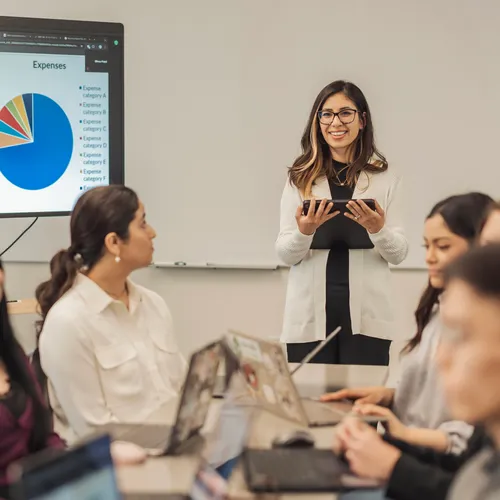 A girl is smiling for a photo