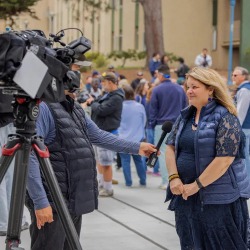 Vanya Quinones being Interviewed at the Otter Statue Unveiling