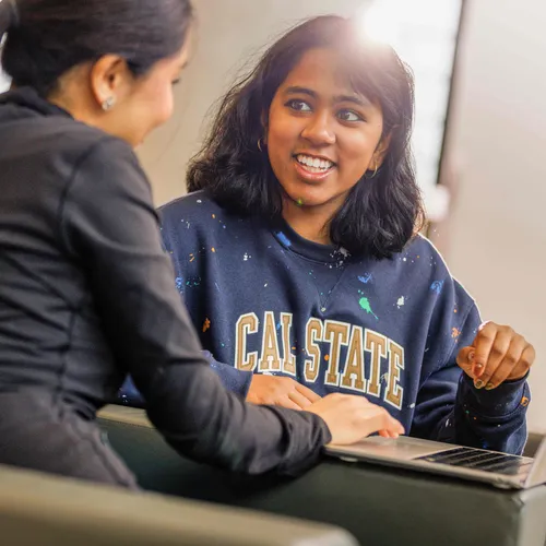 Two girls are talking