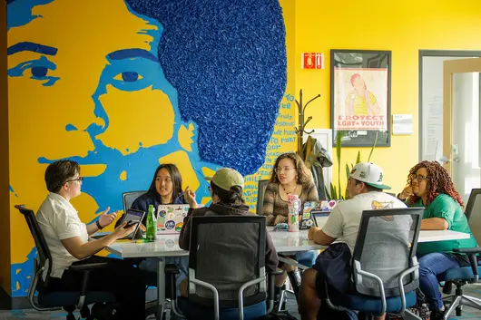 Students in the OSU engaged in conversation for OC3