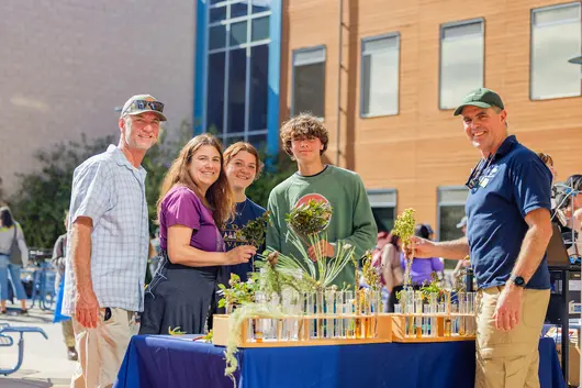 Student family at a science event