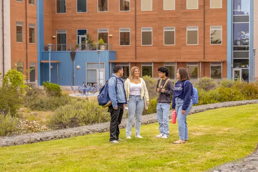 A group of students standing outside of the chapman science building