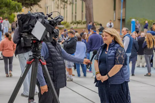 Vanya Quinones being Interviewed at the Otter Statue Unveiling