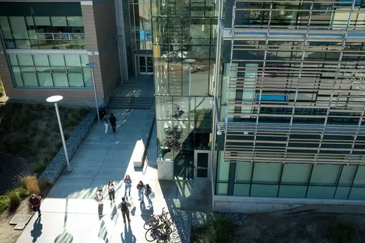 Overhead shot of students outside the business building