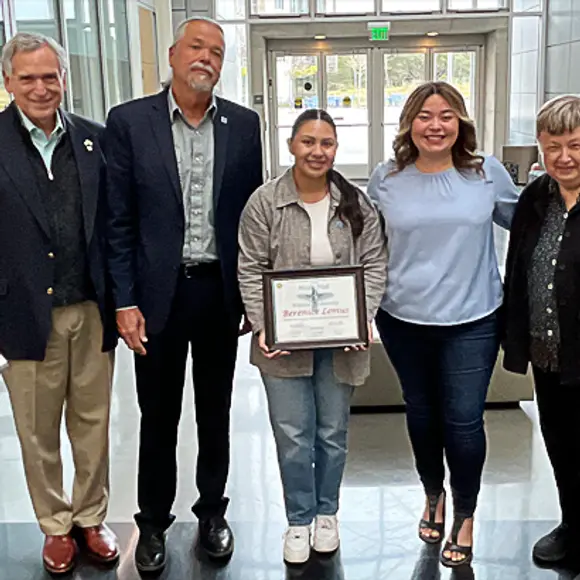 Berenice Lemus with scholarship donor faculty and staff members
