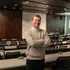 A business administration student smiling at the camera