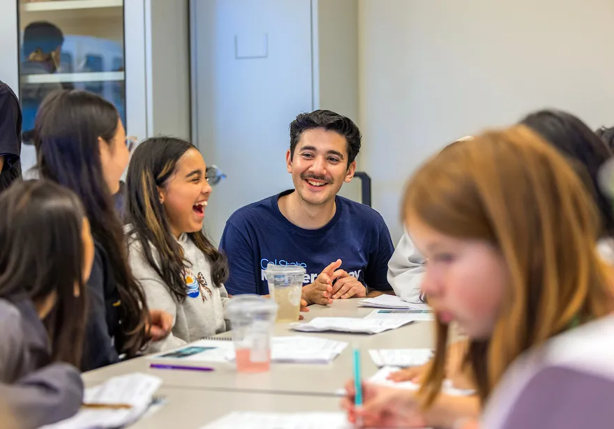 Middle School teacher and students during a campus visit.