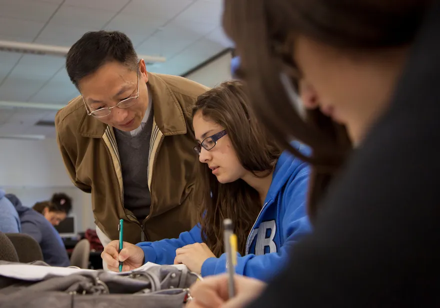 a professor helping a student