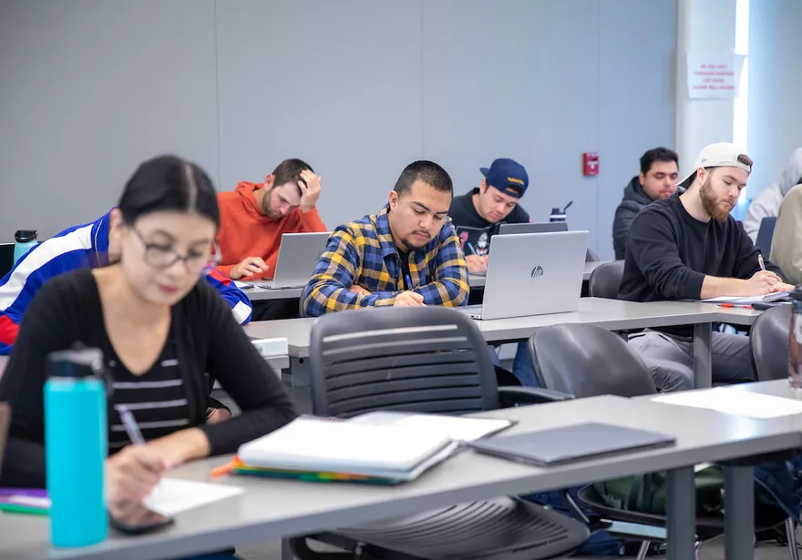 group of students writing