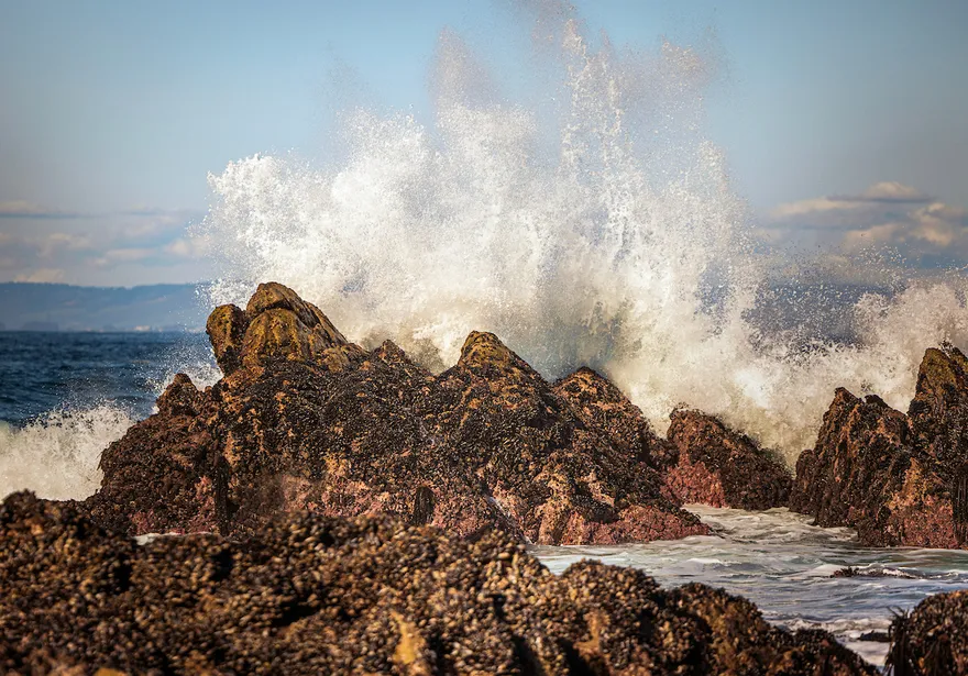 Waves crashing against rocks