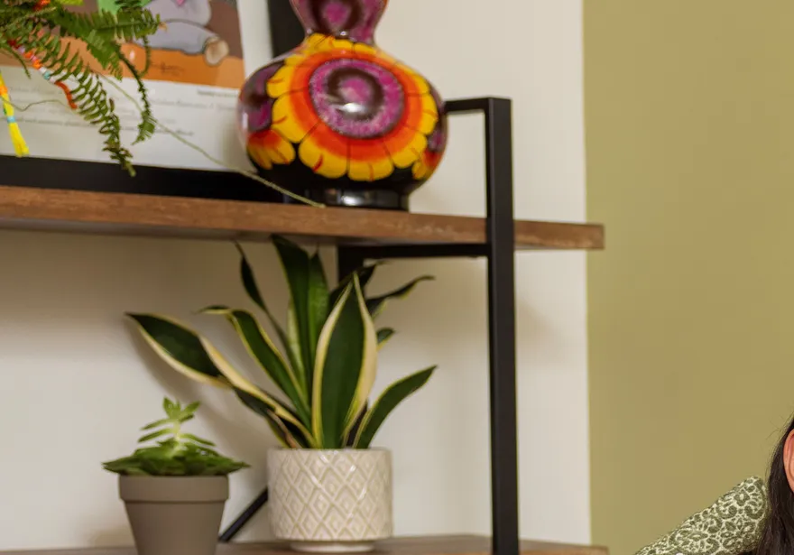 Woman taking notes in a sofa