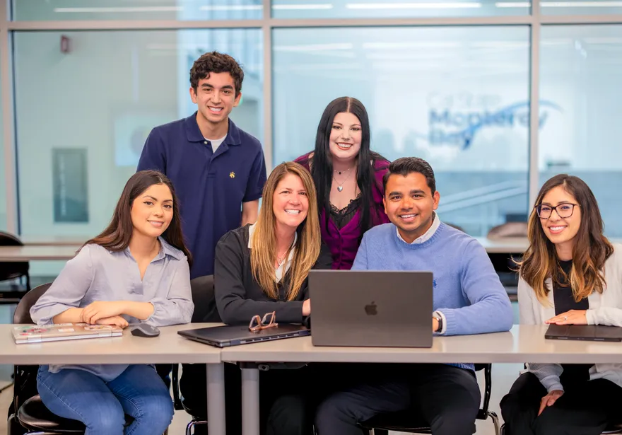 Group photo of accounting professor and students