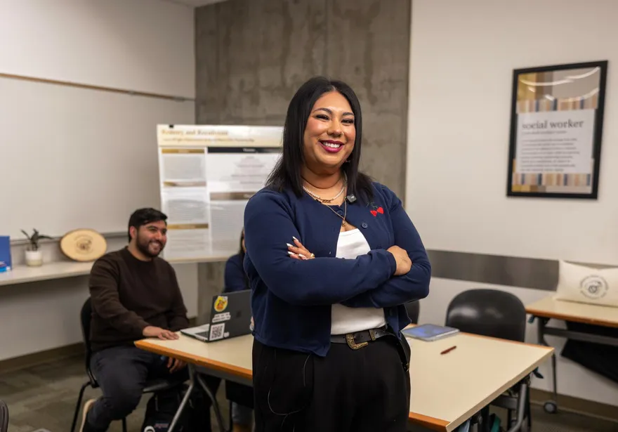 A portrait of a social work credential student smiling at the camera