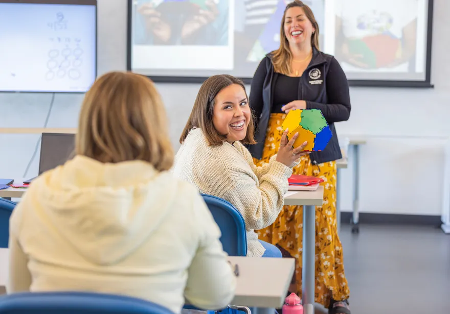 Undergraduate professor and students in classroom