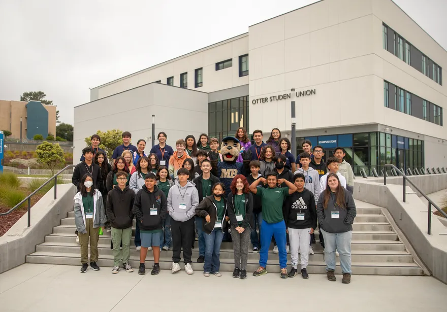 An image of people standing outside the OSU